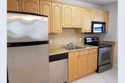 415 NE 2nd St #209, Hallandale Beach, FL 33009 - Photo 1