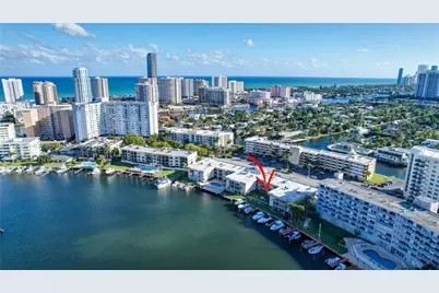 300 Golden Isles Dr #107, Hallandale Beach, FL 33009 - Photo 1