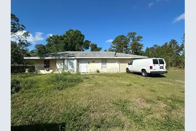 909 Canton Ave, Lehigh Acres, FL 33972 - Photo 1