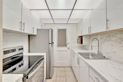 1395 NE 167th St #104, Miami, FL 33162 - Photo 1