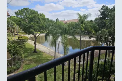 8977 Wiles Rd #304, Coral Springs, FL 33067 - Photo 1