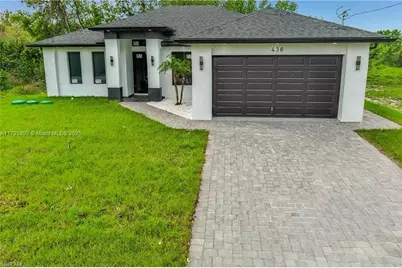 438 S Rathburn St, Lehigh Acres, FL 33974 - Photo 1