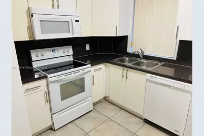 6115 NW 186th St #202, Hialeah, FL 33015 - Photo 1