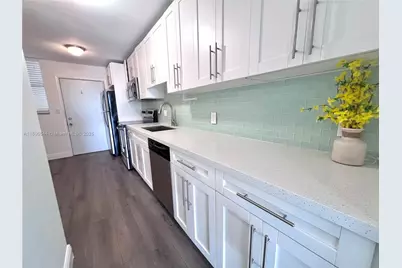 3660 NE 166th St #409, North Miami Beach, FL 33160 - Photo 1