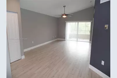 2803 N Oakland Forest Dr #303, Oakland Park, FL 33309 - Photo 1