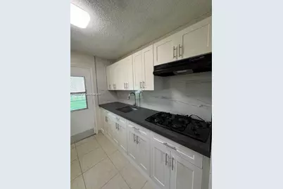 70 NE 202nd Ter #T7, Miami Gardens, FL 33179 - Photo 1