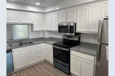 8735 Ramblewood Dr #413, Coral Springs, FL 33071 - Photo 1