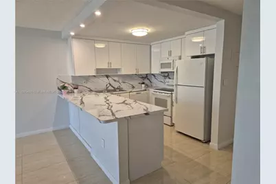 6990 NW 186th St #4-411, Hialeah, FL 33015 - Photo 1