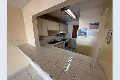 6055 W 19th Ave #410, Hialeah, FL 33012 - Photo 1