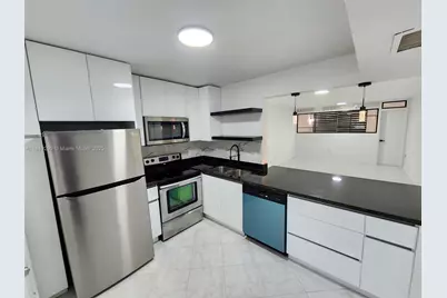 1401 NE 191st St #D110, Miami, FL 33179 - Photo 1