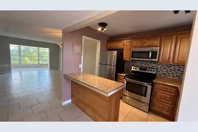 8500 Sunrise Lakes Blvd #303, Sunrise, FL 33322 - Photo 1