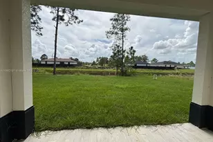 1018 Maddock St E, Lehigh Acres, FL 33974 - Photo 26