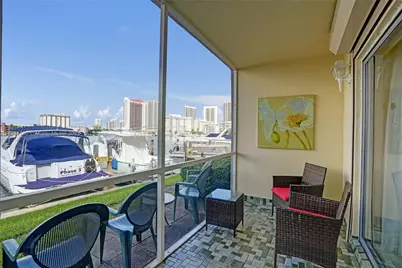 300 Golden Isles Dr #101, Hallandale Beach, FL 33009 - Photo 1
