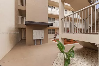 6065 NW 186th St #306, Hialeah, FL 33015 - Photo 1