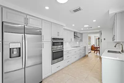 19435 E Lake Dr, Miami, FL 33015 - Photo 1