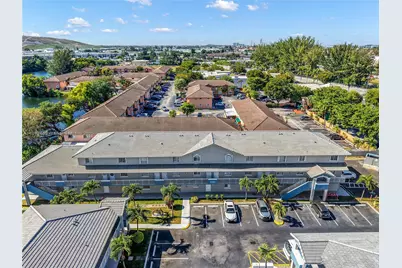 8390 NW 103rd St #102H, Hialeah Gardens, FL 33016 - Photo 1
