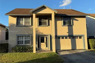 7809 NW 192nd St, Hialeah, FL 33015 - Photo 1