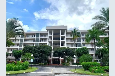 2950 N Palm Aire Dr #105, Pompano Beach, FL 33069 - Photo 1