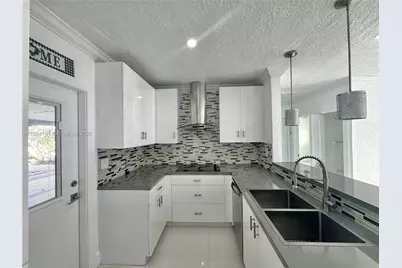 1211 W 34th St #Front, Hialeah, FL 33012 - Photo 1
