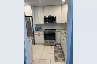 2900 N Palm Aire Dr #409, Pompano Beach, FL 33069 - Photo 1