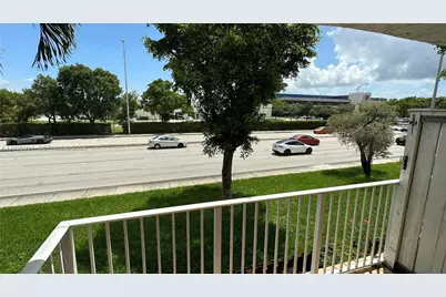 250 NW 107th Ave #202, Miami, FL 33172 - Photo 1