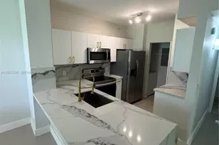 8000 N Nob Hill Rd, Tamarac, FL 33321 - Photo 1