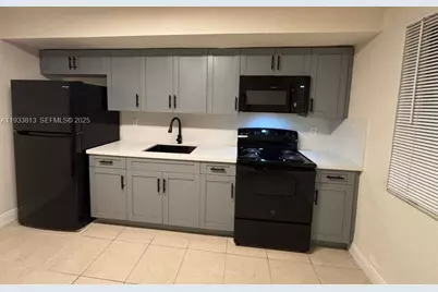 561 NW 113th St #563, Miami Shores, FL 33168 - Photo 1