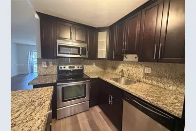 300 Gardens Dr #104, Pompano Beach, FL 33069 - Photo 1