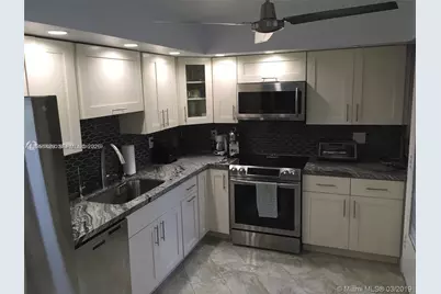 1401 NE 191st St #D217, Miami, FL 33179 - Photo 1