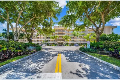 4030 W Palm Aire Dr #104, Pompano Beach, FL 33069 - Photo 1