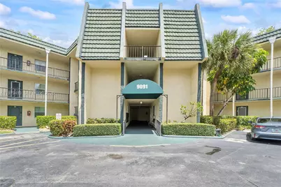 9091 Lime Bay Blvd #110, Tamarac, FL 33321 - Photo 1
