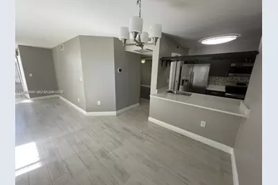 2811 N Oakland Forest Dr #110, Oakland Park, FL 33309 - Photo 1