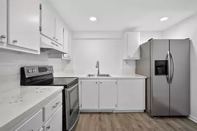 9091 Lime Bay Blvd #A107, Tamarac, FL 33321 - Photo 1