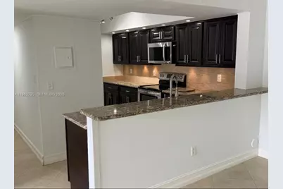 18870 NW 57th Ave #101, Hialeah, FL 33015 - Photo 1