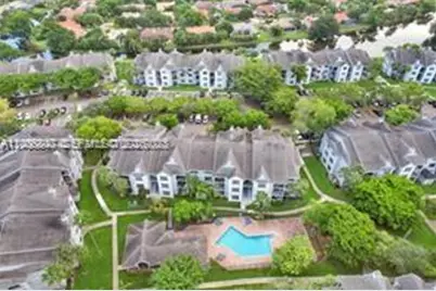11241 W Atlantic Blvd #302, Coral Springs, FL 33071 - Photo 1