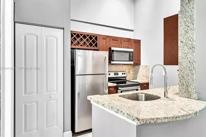 2851 N Oakland Forest Dr #306, Oakland Park, FL 33309 - Photo 1