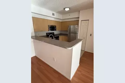 8070 N Nob Hill Rd #205, Tamarac, FL 33321 - Photo 1