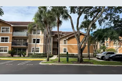 8871 Wiles Rd #208, Coral Springs, FL 33067 - Photo 1