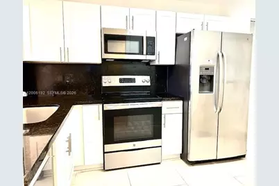 871 NE 207th Ter #4-101, Miami, FL 33179 - Photo 1