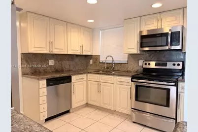 3100 Riverside Dr #103, Coral Springs, FL 33065 - Photo 1