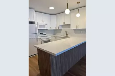 6070 W 19th Ave #115, Hialeah, FL 33012 - Photo 1