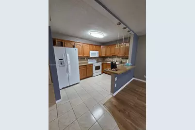 4133 NW 88th Ave #102, Coral Springs, FL 33065 - Photo 1