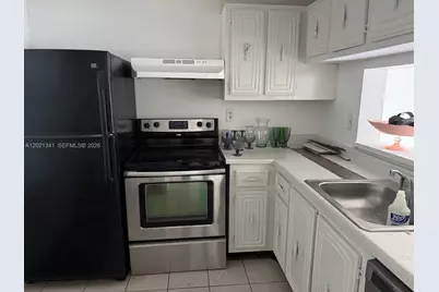 492 NW 165th St Rd #C-209, Miami, FL 33169 - Photo 1