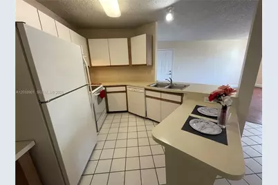 4015 W McNab Rd #D212, Pompano Beach, FL 33069 - Photo 1