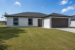 702 Carbon St, Lehigh Acres, FL 33974 - Photo 1