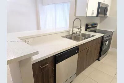 9645 NW 1st Ct #1-209, Pembroke Pines, FL 33024 - Photo 1