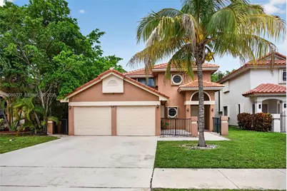 587 NW 38th Ave, Deerfield Beach, FL 33442 - Photo 1
