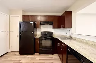 879 NE 195th St, Miami, FL 33179 - Photo 1