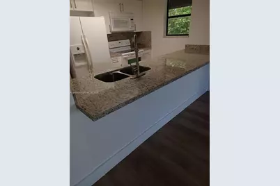 16220 NW 2nd Ave #411, Miami, FL 33169 - Photo 1