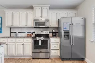 7109 S Lagoon Dr S, Panama City Beach, FL 32408 - Photo 8